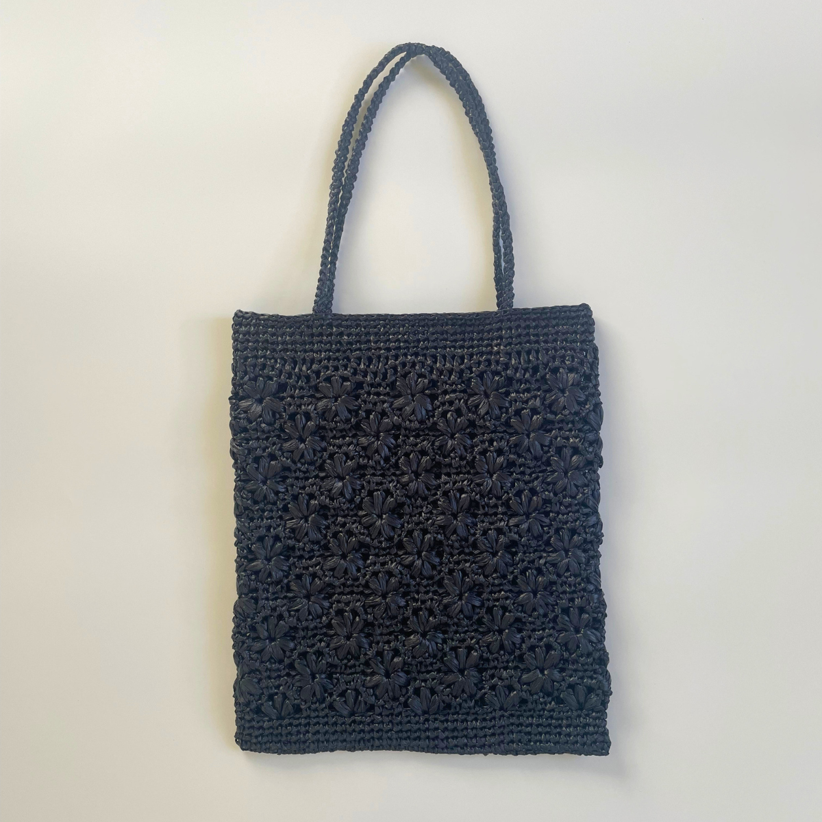 atelier a&h / 花模様編みのぺたんこバッグ