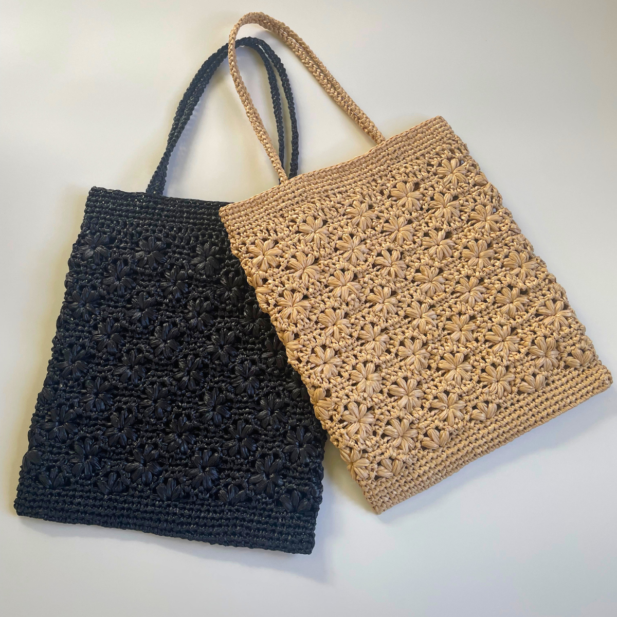 atelier a&h / 花模様編みのぺたんこバッグ